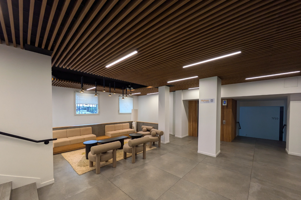 rea de descanso en Coworking Hiptown con diseño acogedor por Spigogroup